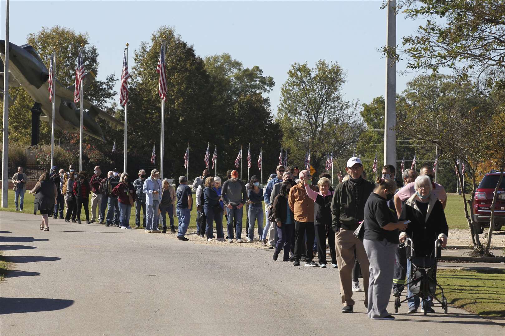 Voters queue to cast ballots in Tupelo, Mississippi (Thomas Wells/The Northeast Mississippi Daily Journal via AP)