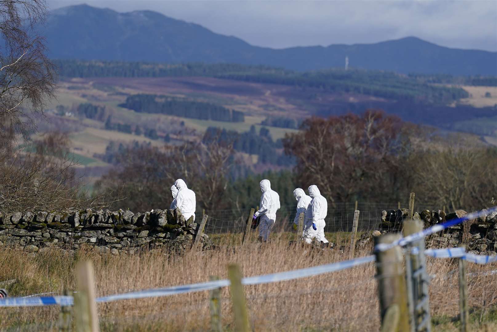 Police at the scene in the Pitilie area on the outskirts of Aberfeldy (Andrew Milligan/PA)