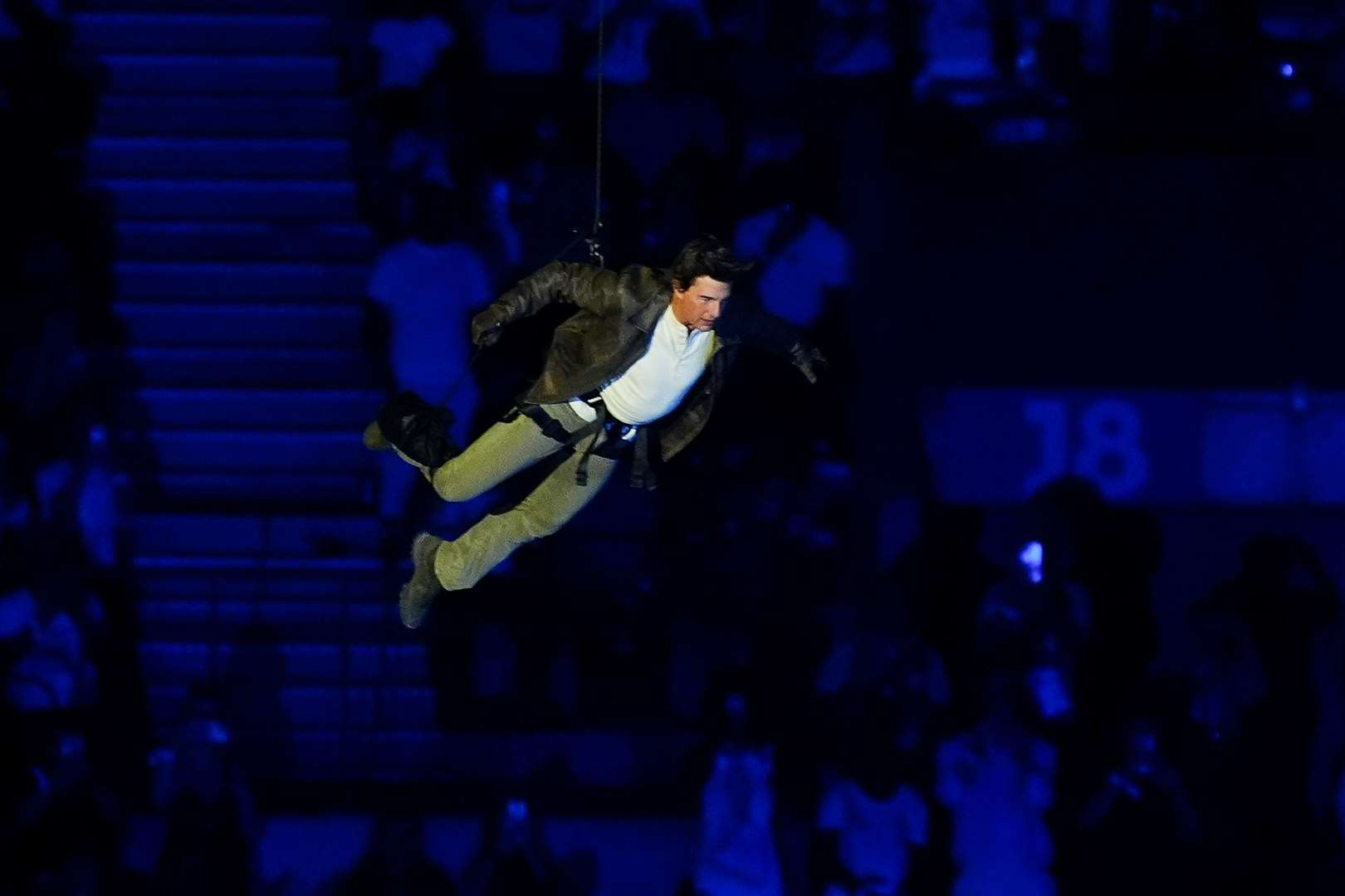 Actor Tom Cruise jumps from the stadium roof during the closing ceremony of the 2024 Paris Olympic Games (David Davies/PA)