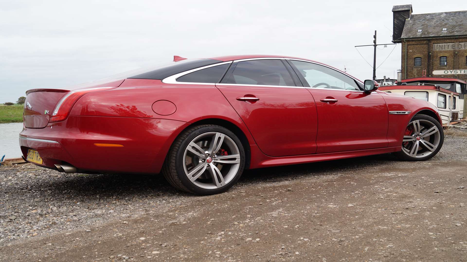 The subtle spoiler and quad exhausts hint at the performance