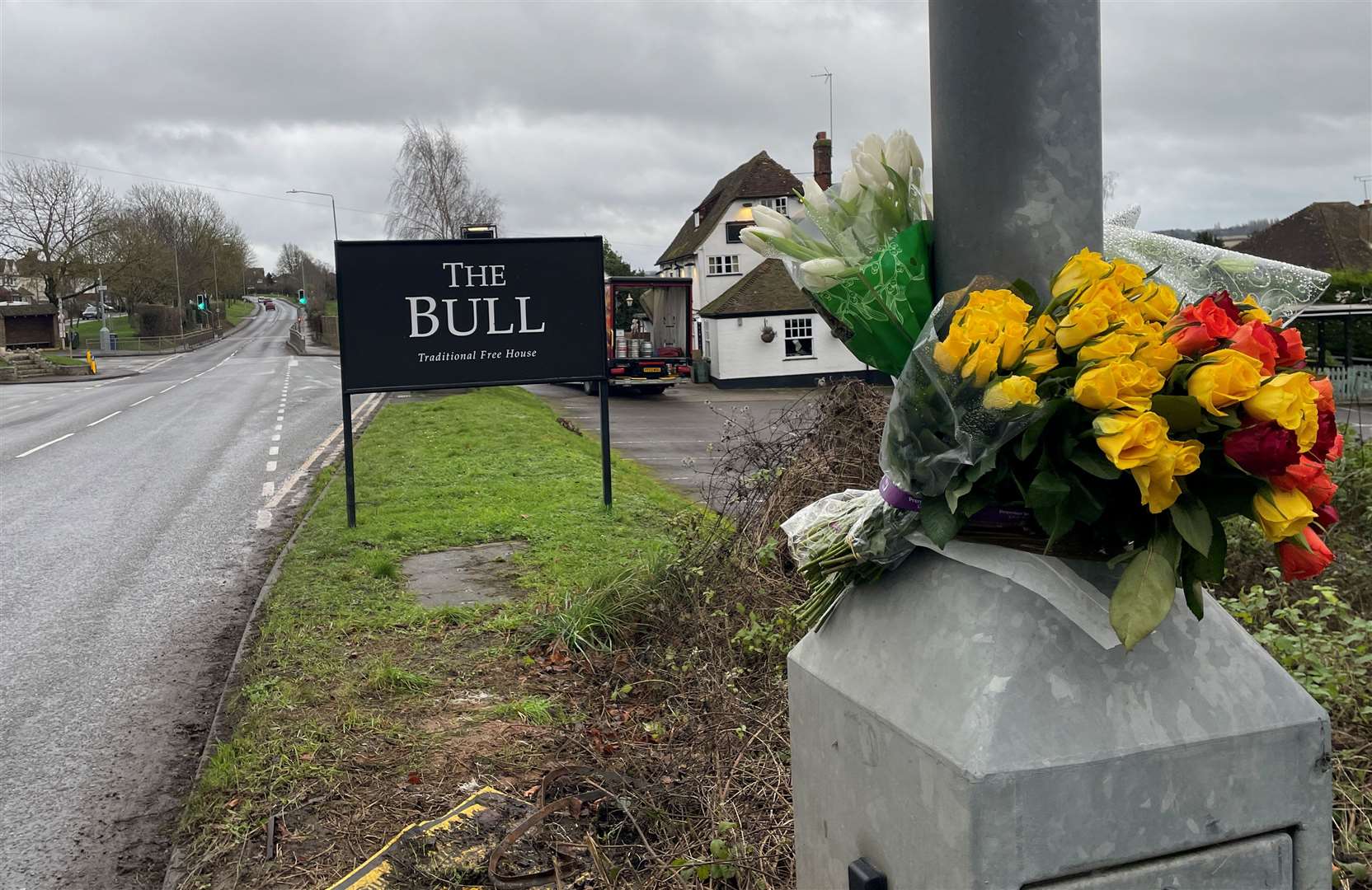 Floral tributes left outside The Bull pub in Barming after a fatal crash in Tonbridge Road on Christmas Eve. Picture: KMG