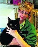 Vet nurse Emma Collins with Kitts