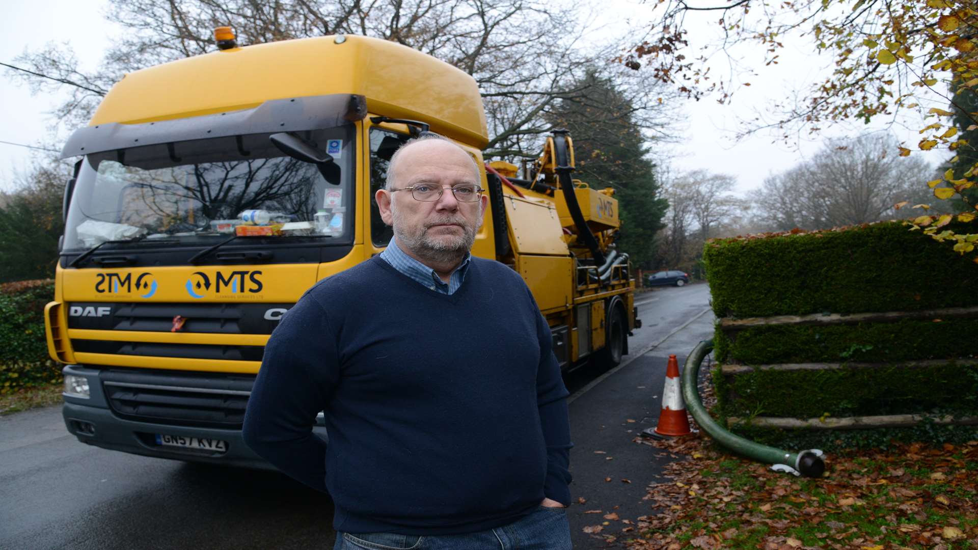 Brendan Morrissey with one of the tankers that visits the hamlet every few hours. Picture: Gary Browne