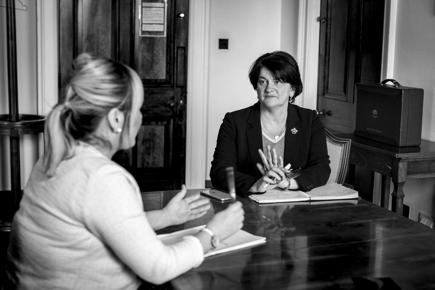 Mrs Foster and Ms O’Neill chat before a joint call with business representatives (Liam McBurney/PA)