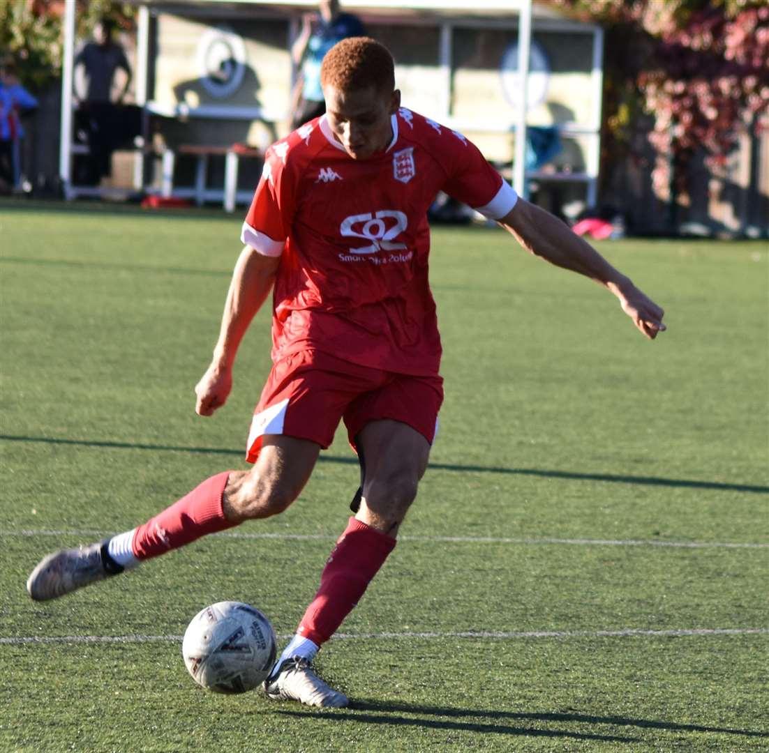 In-form forward Tashi-Jay Kwayie scores goal number three for Faversham Town in injury time during their 3-1 victory at Fisher on Saturday. Picture: Alan Coomes