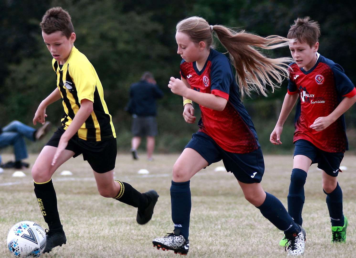 Rainham Eagles under-11s (yellow/black) dictate play against Hempstead Valley under-11s Picture: Phil Lee