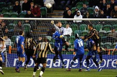 Simon Royce fails to claim in the lead up to Barnet's equaliser. Picture: MATTHEW WALKER