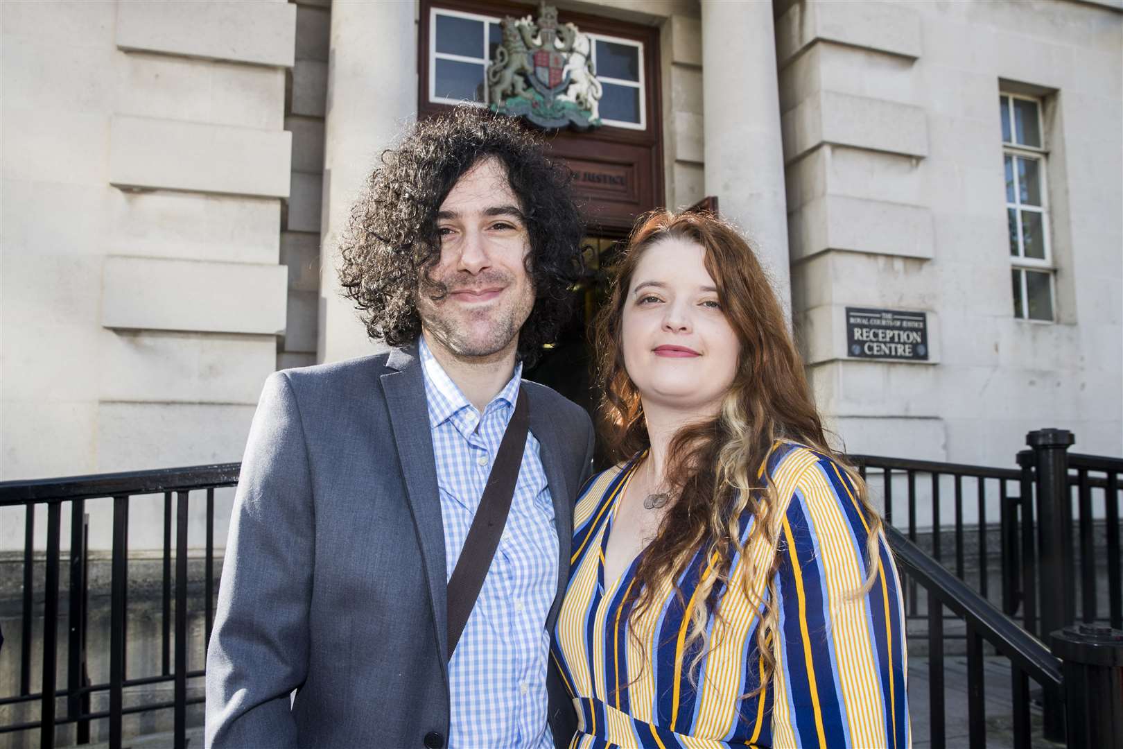 Emma DeSouza and Jake DeSouza outside the Royal Courts of Justice in Belfast (PA)