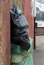 BINNED: All that remained this week were some of the flowers in sacks waiting to be taken away. Pictures: GRAHAM TUTTHILL