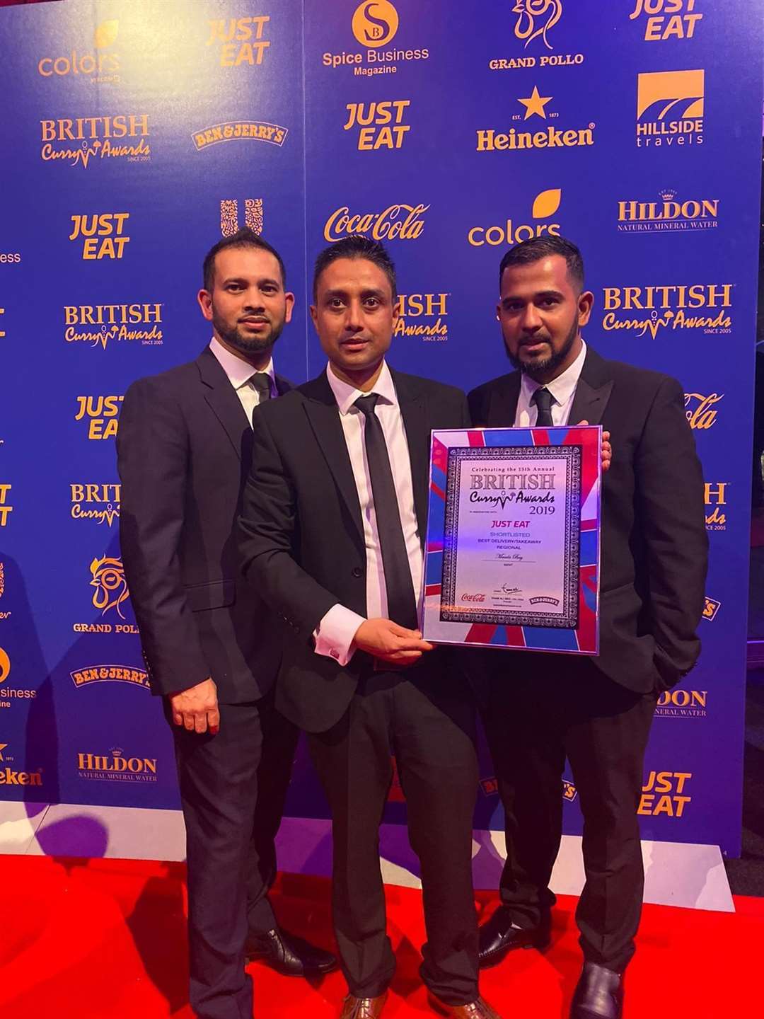 Masala Bay celebrating being shortlisted for best takeaway at the 2019 British Curry Awards