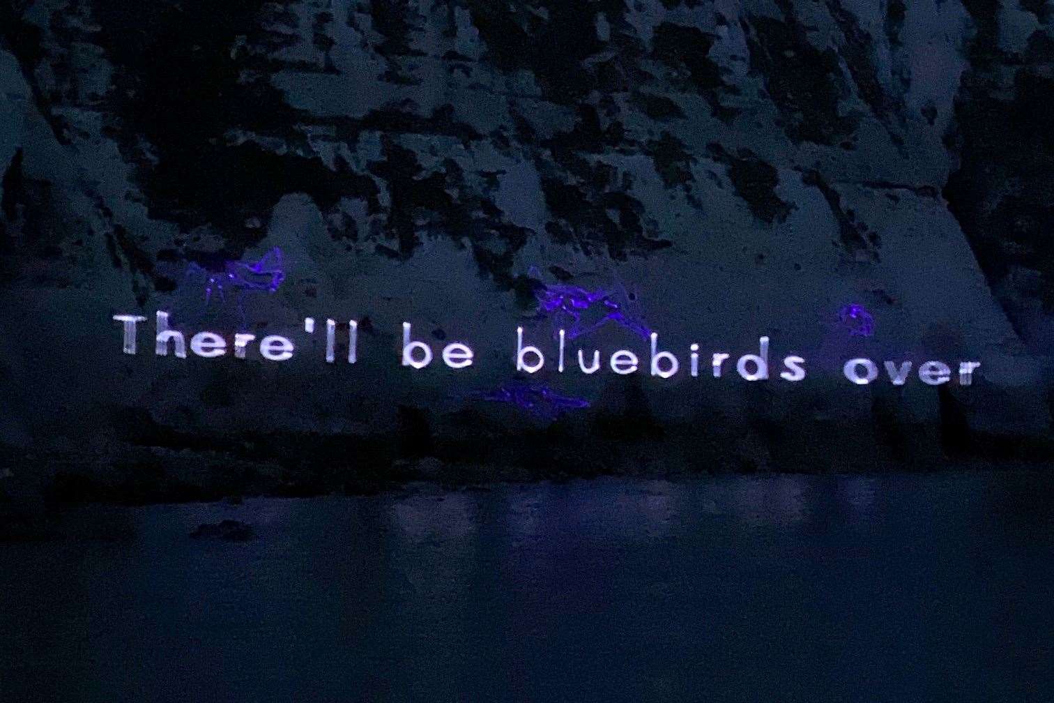 Beamed laser tribute to Dame Vera Lynn on the White Cliffs of Dover at Samphire Hoe Country Park, Dover. Picture: Barry Goodwin