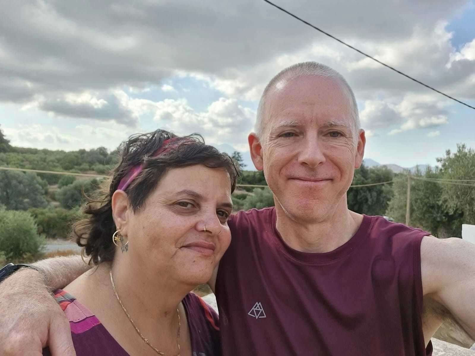 Ben King, 52, with his wife Meyrav, who was trapped for 12 hours in his home after it was set on fire by Hamas (Ben King/PA)