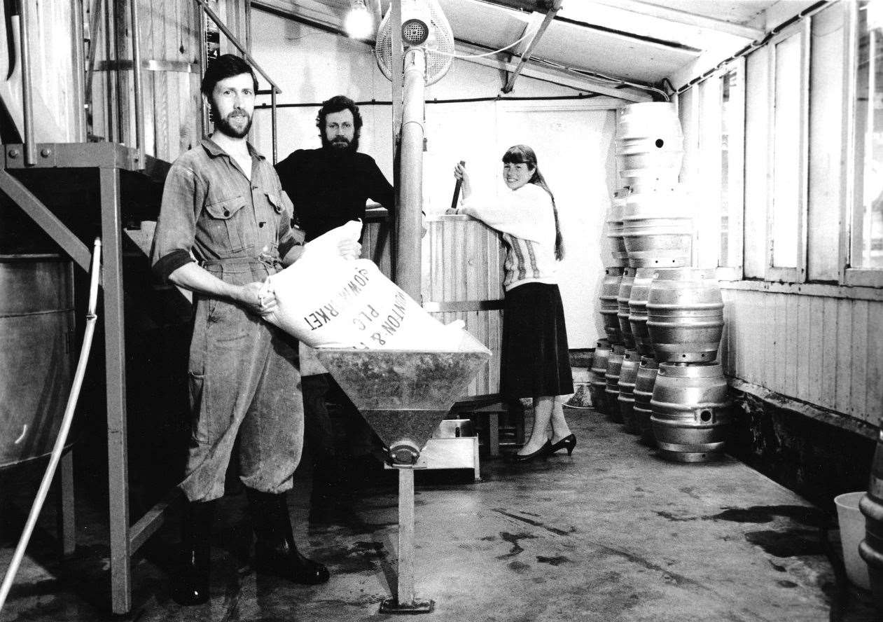 Brewery worker Nigel Deas, alongside Phil and Debbie Goacher at Goacher's original Hayle Mill premises