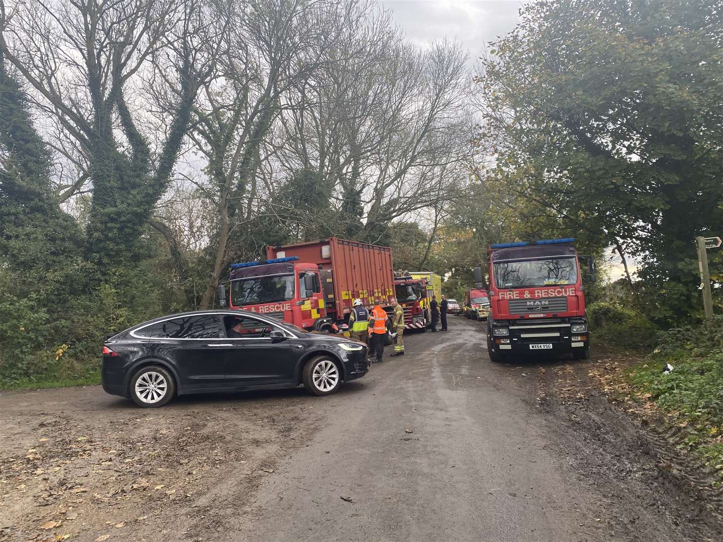 Emergency services are working to rescue two people trapped after an aircraft crash in Chatham