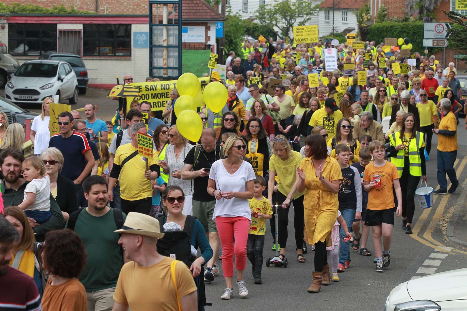 Campaigners opposed to a garden community in Marden march through the village