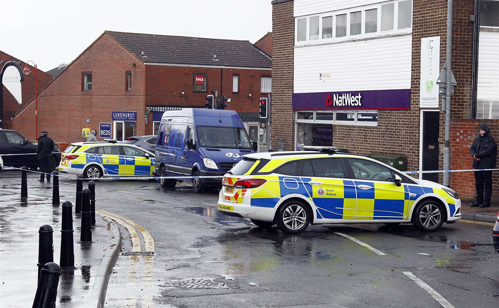 Police and the G4S delivery van at NatWest, in High Street, Rainham. Picture: Sean Aidan