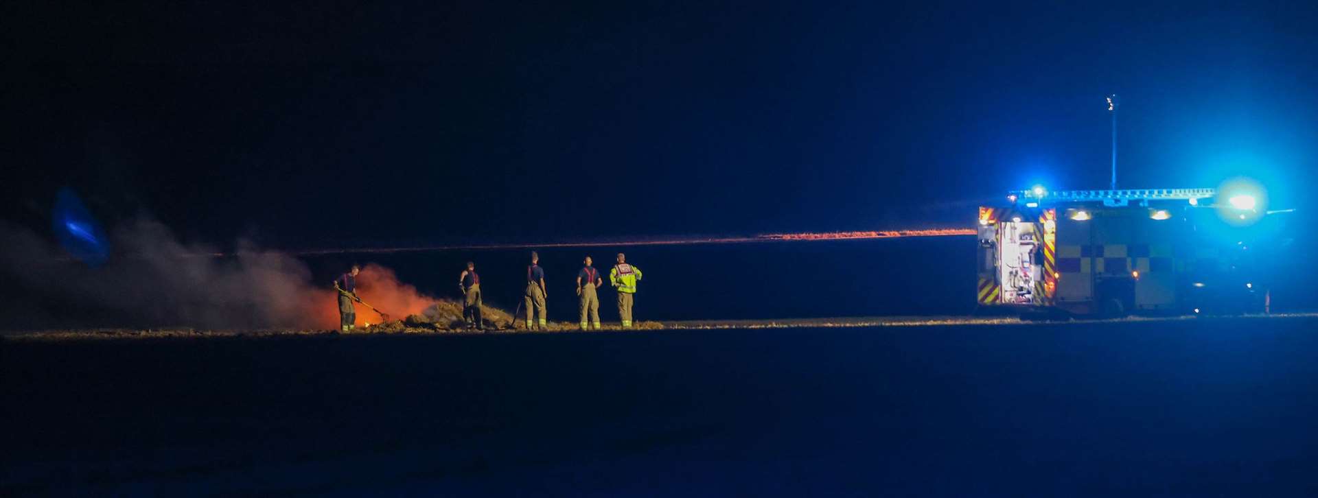 Firefighter at the scene of the blaze in Lydden. Picture: UKNIP