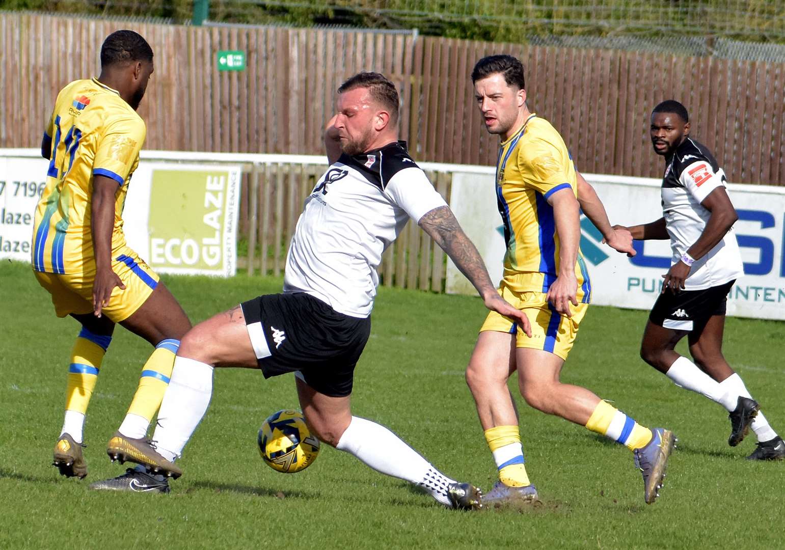 Town defender Darren Phillips gets stuck in. Picture: Randolph File