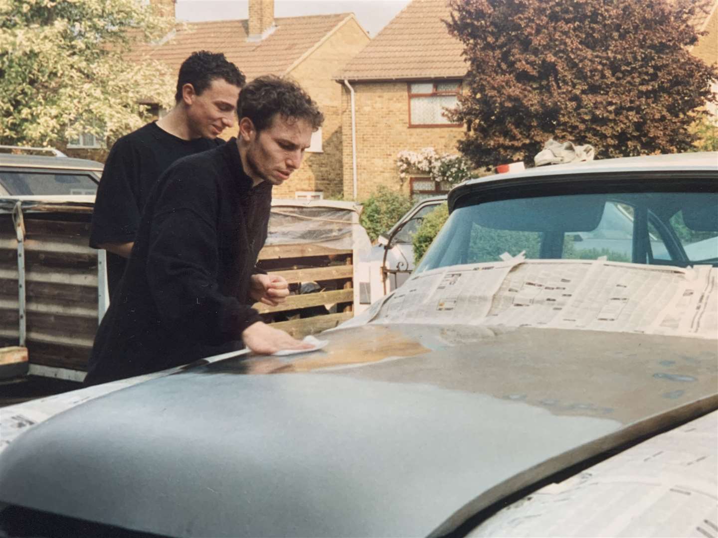 Ross Hutchinson and his brother Ryde working on the Chrysler