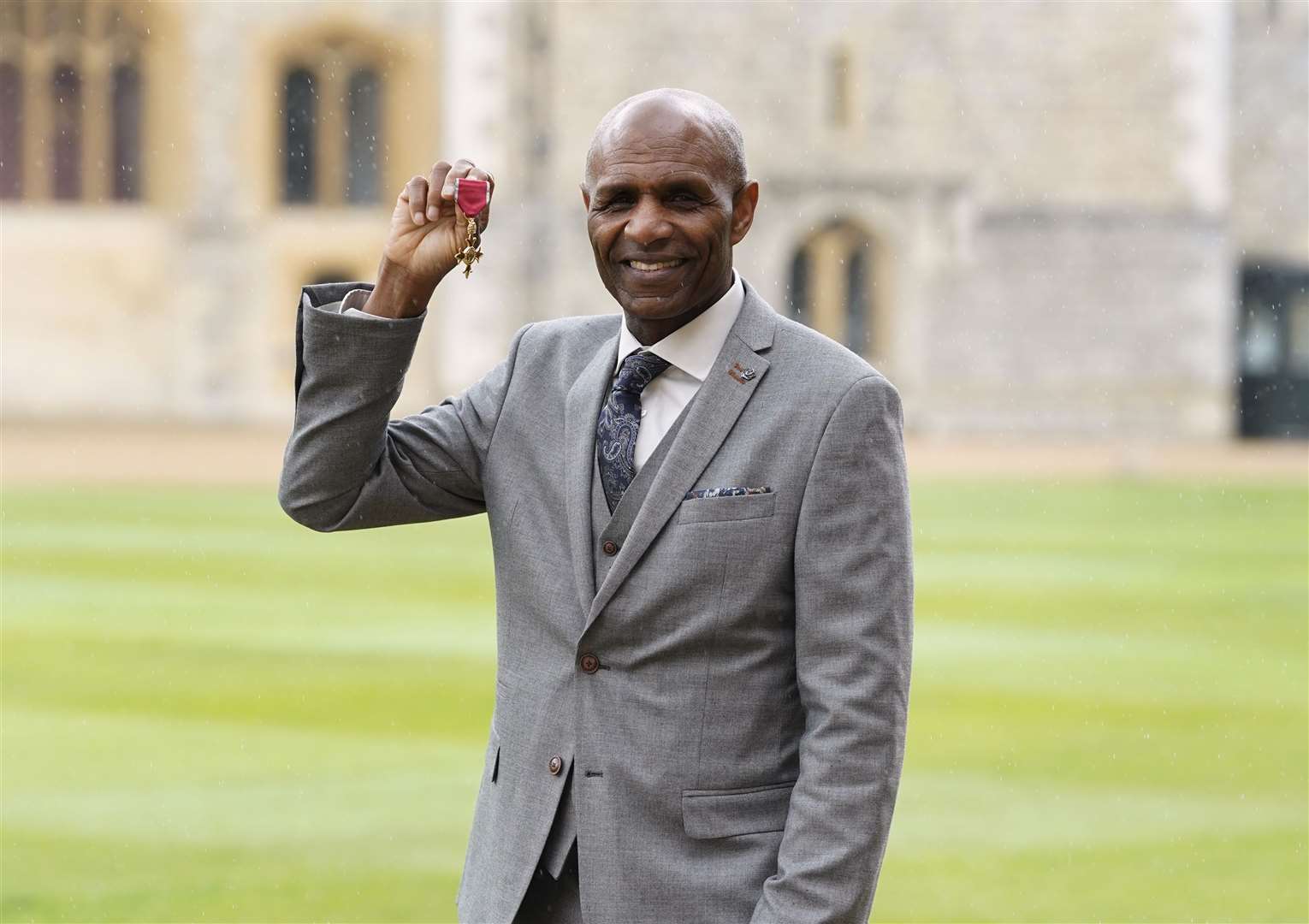 Luther Blissett swapped footballing tales with the Prince of Wales after being made an OBE during an investiture ceremony at Windsor Castle (Andrew Matthews/PA)