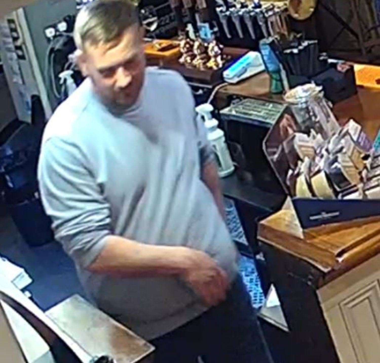 William Cosier behind the bar at the Queen's Head pub on the night he fatally stabbed Adam Pritchard outside. Pic: Crown Prosecution Service