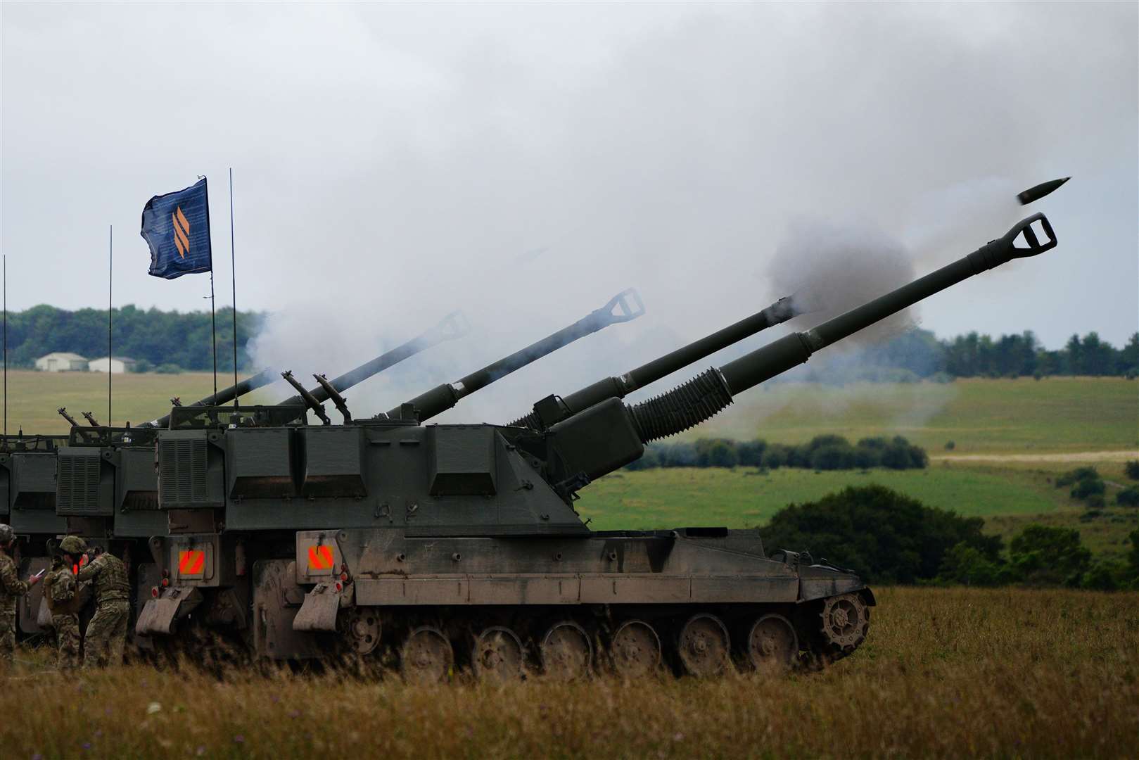 Newly trained Ukrainian artillery specialists firing British donated AS90 155mm self-propelled artillery guns (Ben Birchall/PA)