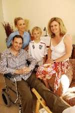 Jim recovering at home with wife Hester, daughter Lottie, 14, and son Edward, 8