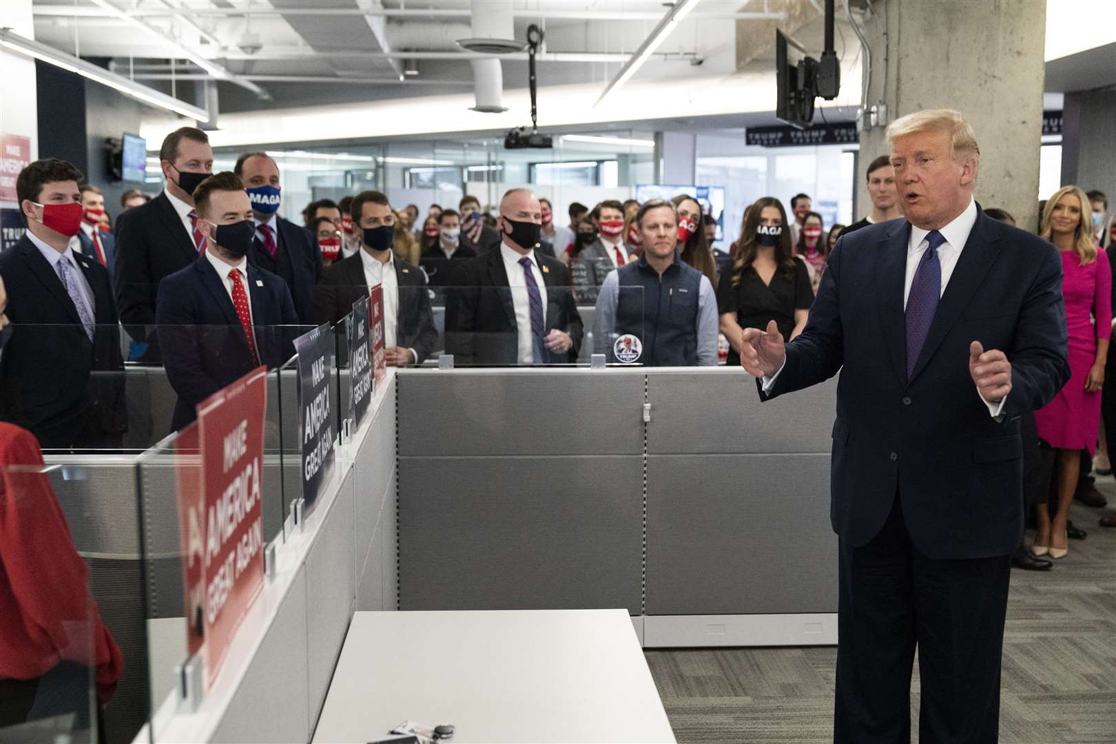 President Donald Trump meets supporters at his campaign headquarters in Arlington, Virginia (Alex Brandon/AP)