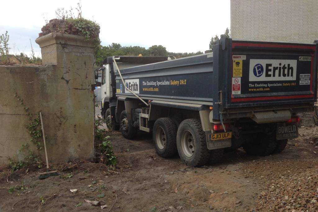 Erith delivering aggregates next to historic gate pier.