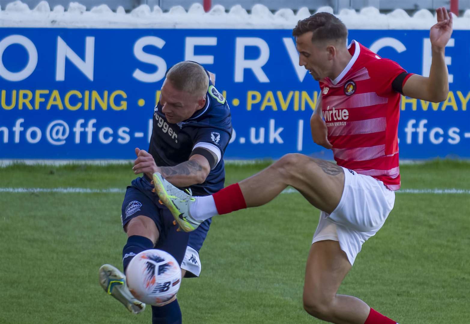 Ebbsfleet United's Ben Chapman closes down Dover Athletic defender Myles Judd. Picture: Ed Miller / EUFC