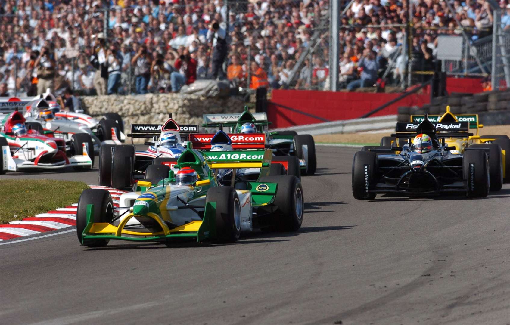 Nelson Piquet Jr leads the field into Paddock Hill Bend in 2005. Picture: Barry Goodwin