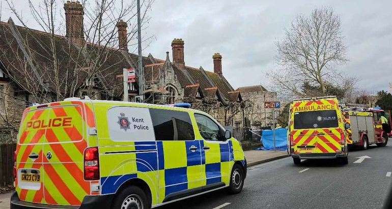 The emergency services in College Road, Maidstone, where a tarpaulin was put up