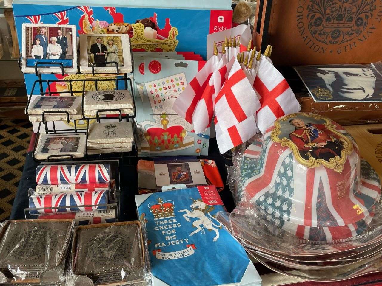 The pub’s gift shop is already stocked with commemorative merchandise, which includes mugs, postcards, flags and tea-towels (Mike Bedigan/PA)