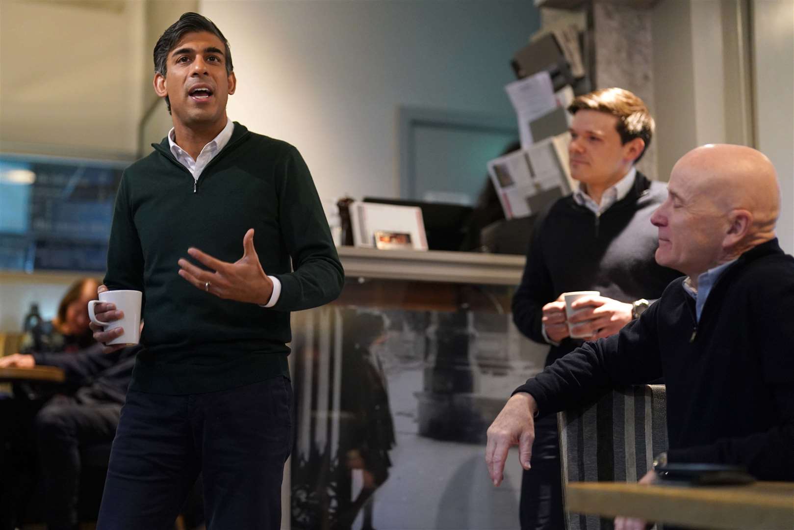 Prime Minister Rishi Sunak, left, during a visit to La Dolce Vita cafe in Marple, Stockport on Friday (Jacob King/PA)