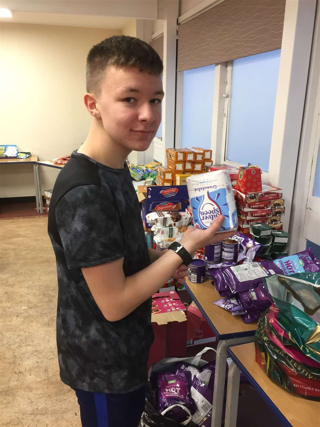 The hampers include essential groceries and some Christmas treats