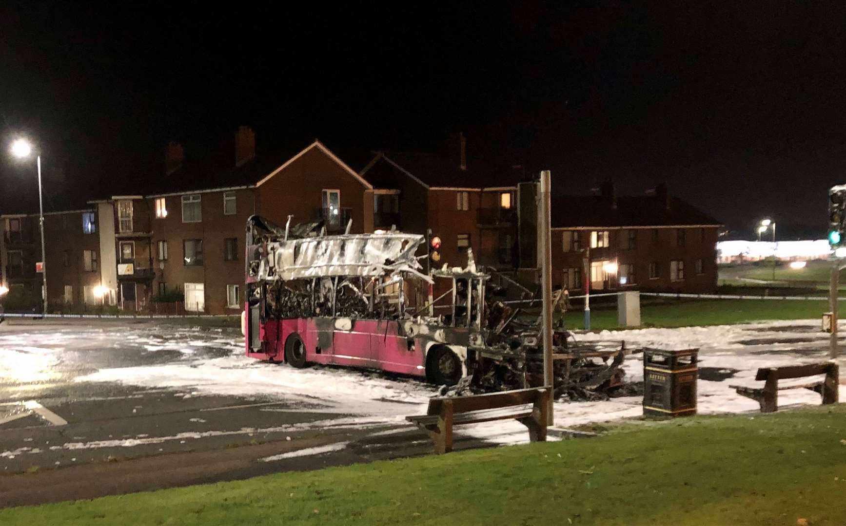 The burnt out double decker bus in Church Road near Rathcoole in Newtownabbey (David Young/PA)