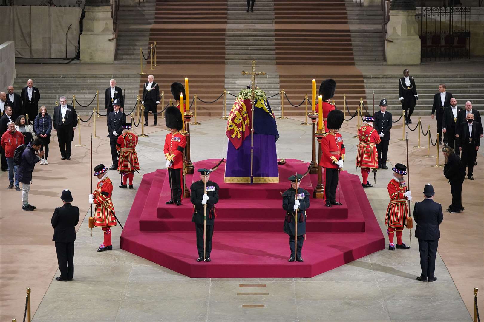 Members of the public pay their respects at the coffin of Queen Elizabeth II (Yui Mok/PA)