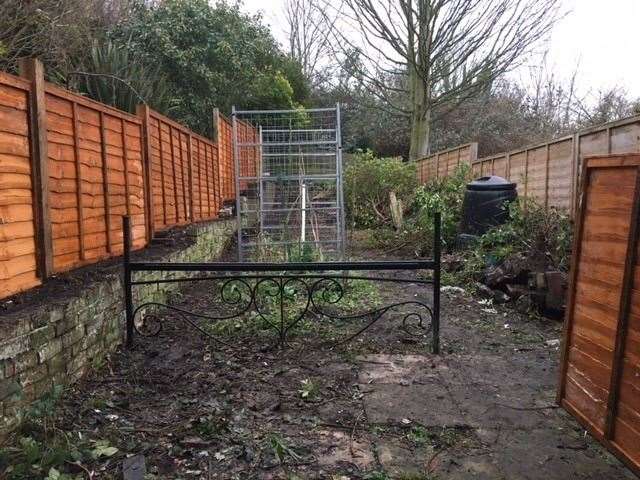 Wet and frozen, these posts and fence panels took a fair bit of shifting along the rear alley and over the back fence