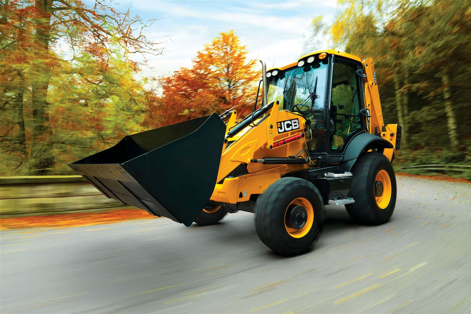 The JCB 3CX digger being used by Jessica Bull on her wedding day. Picture: Diggerland