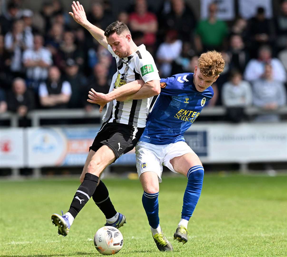 Luke Allen gets into a tangle for Dartford during Sunday’s National League South Play-Off Semi-Final against St Albans Picture: Keith Gillard