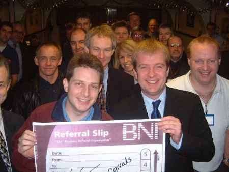 Chapter director, Gary Crouch (right, front) with Steve Root who passed the 10,000th referral