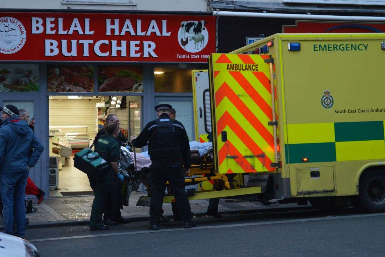 Paramedics load the man into the back of an ambulance parked at the bottom of High Street, Maidstone