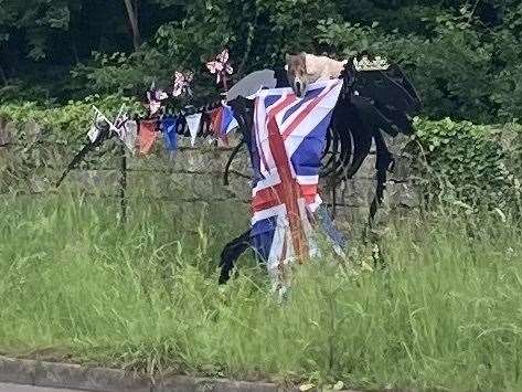 Spike the dinosaur dressed up for the Jubilee on the A20 in Maidstone