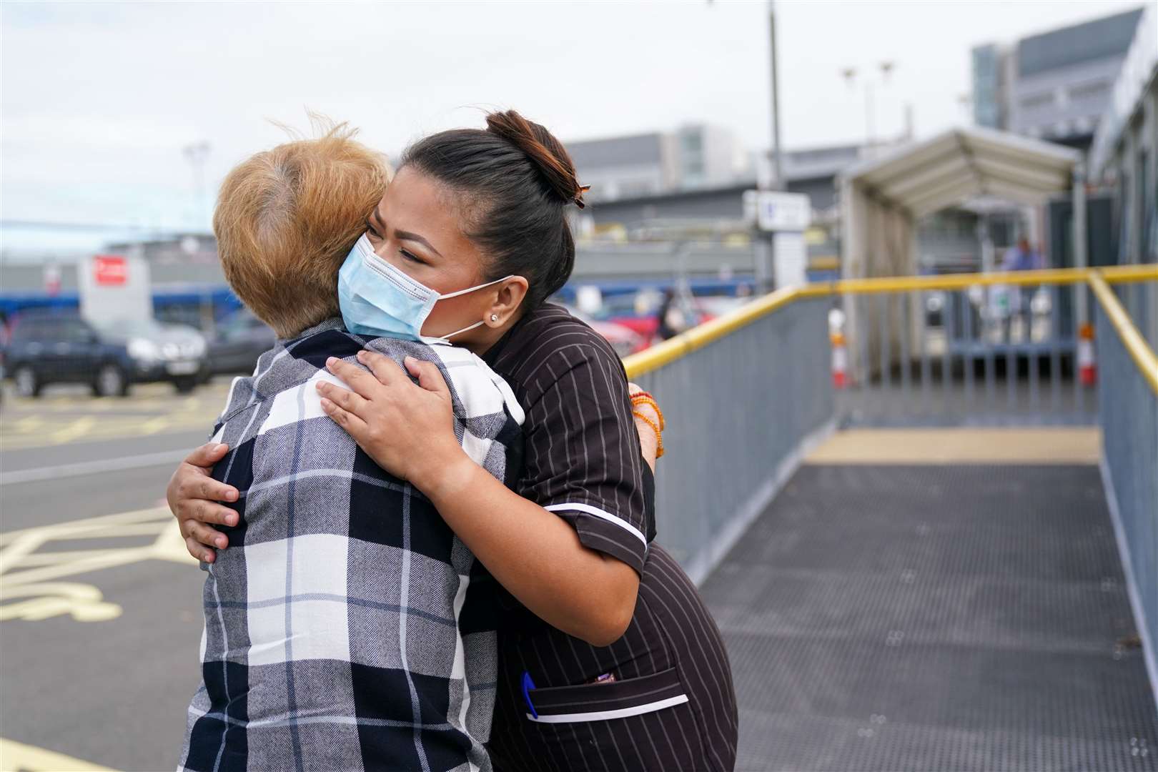 Margaret Keenan is reunited with matron May Parsons, who gave her the first ever Covid-19 jab (Jacob King/PA)