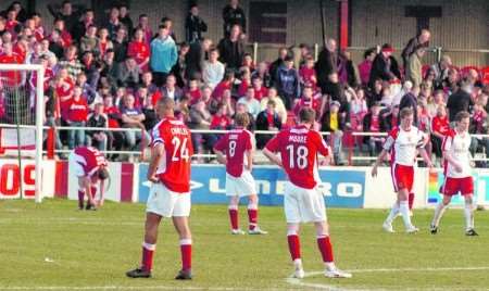 Ebbsfleet players are dejected as Peter Vincenti scores Stevenage's injury time winner. Picture: Steve Crispe