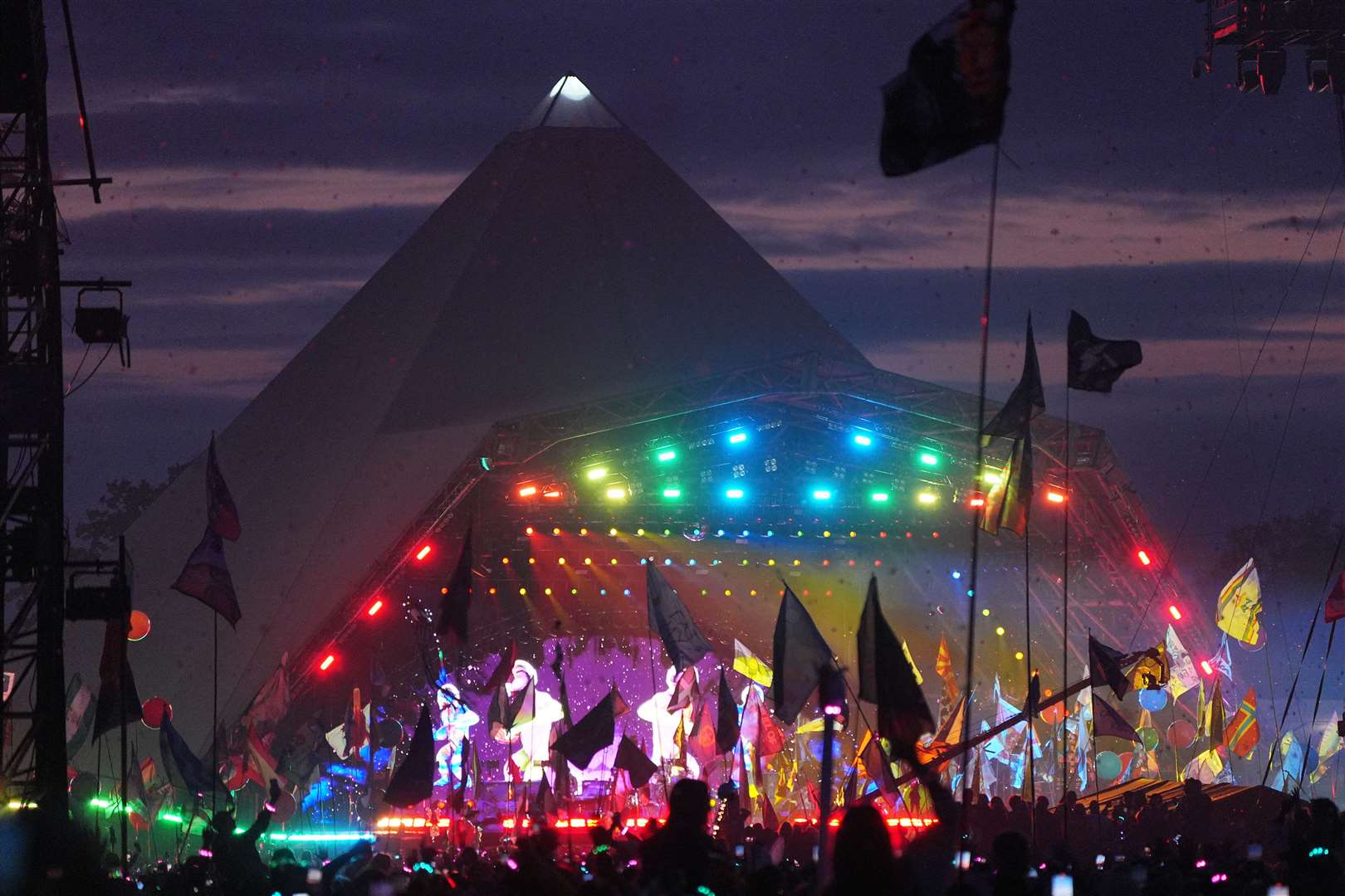 The crowd watching Coldplay performing on the Pyramid Stage at Glastonbury Festival (Yui Mok/PA)