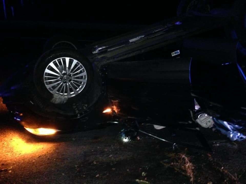 The family's car on its roof on the M2