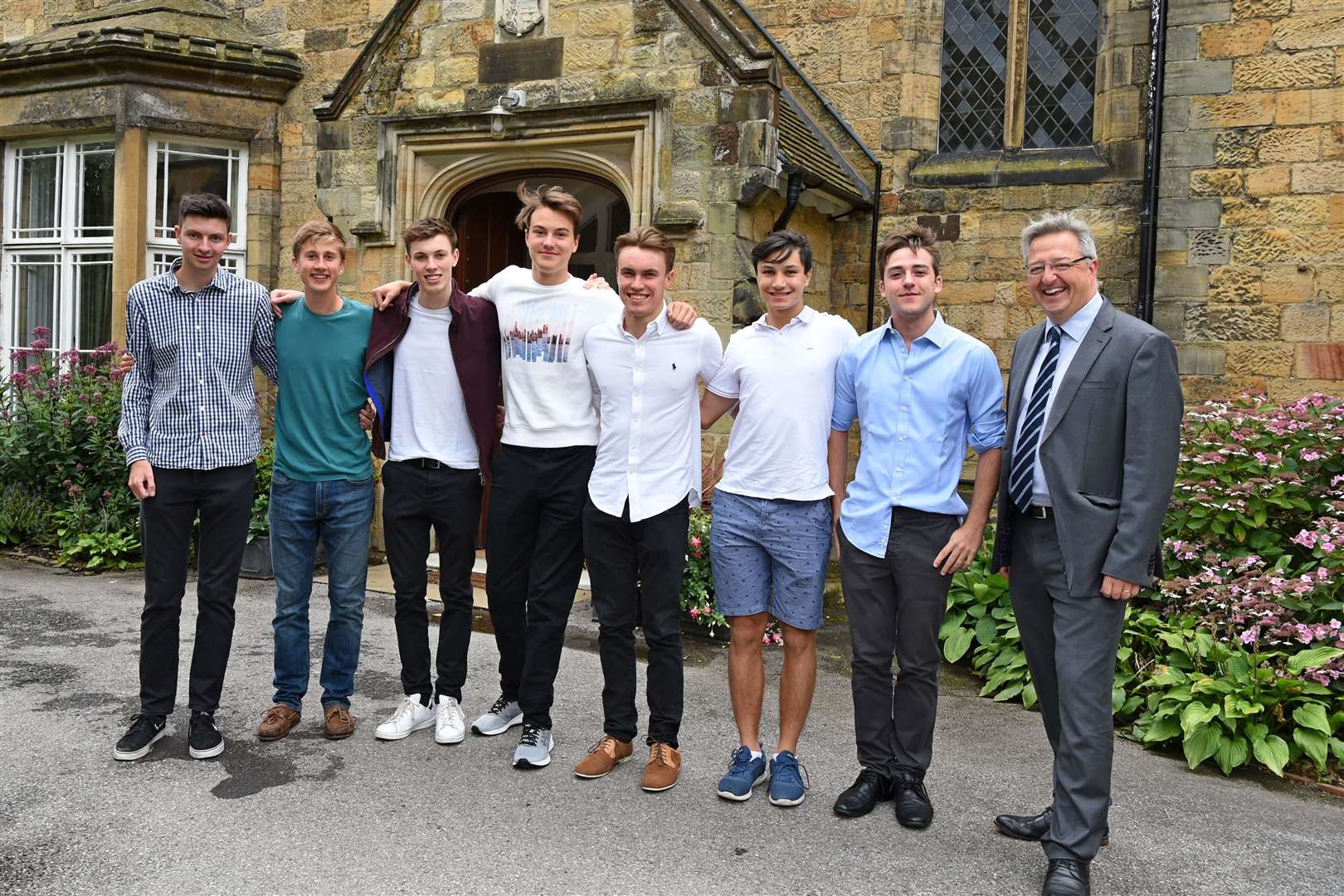 Seven of the Tonbridge School boys who achieved a ‘clean sweep’ of top grades with James Priory, Headmaster (15280643)