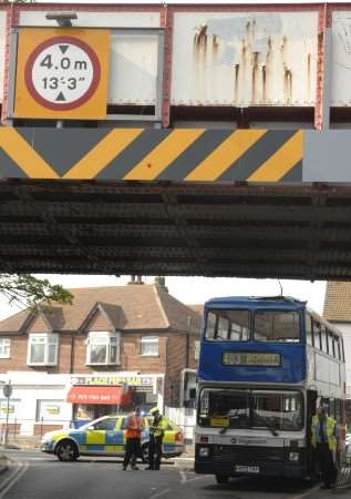 Passengers escaped serious injury when a double-decker bus got wedged under a bridge at Swalecliffe railway station on Saturday