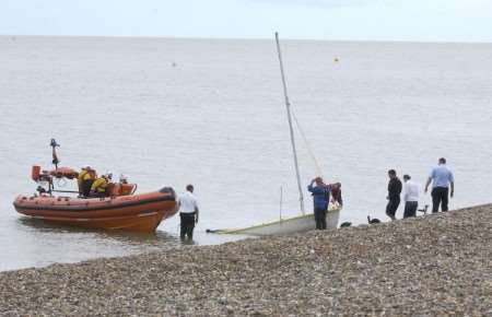 The Herne Bay mobile coastguard unit assist with recovery after Whitstable Lifeboat brought a dinghy ashore at Hampton after it capsized. Picture: RNLI Whitstable.